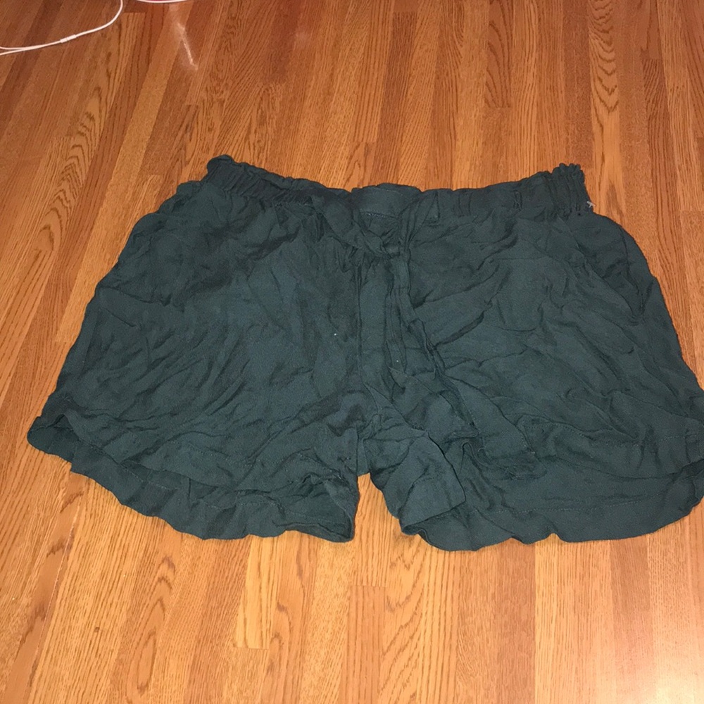 flowy green shorts with a tie